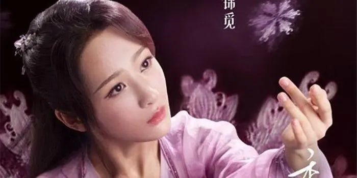 Woman in traditional Chinese costume performing graceful hand gesture against a purple floral background