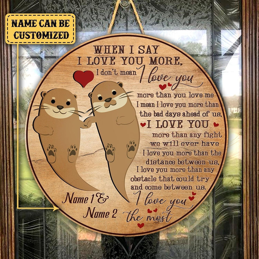 Personalized When I Say I Love You More Otter Wood Round Sign.