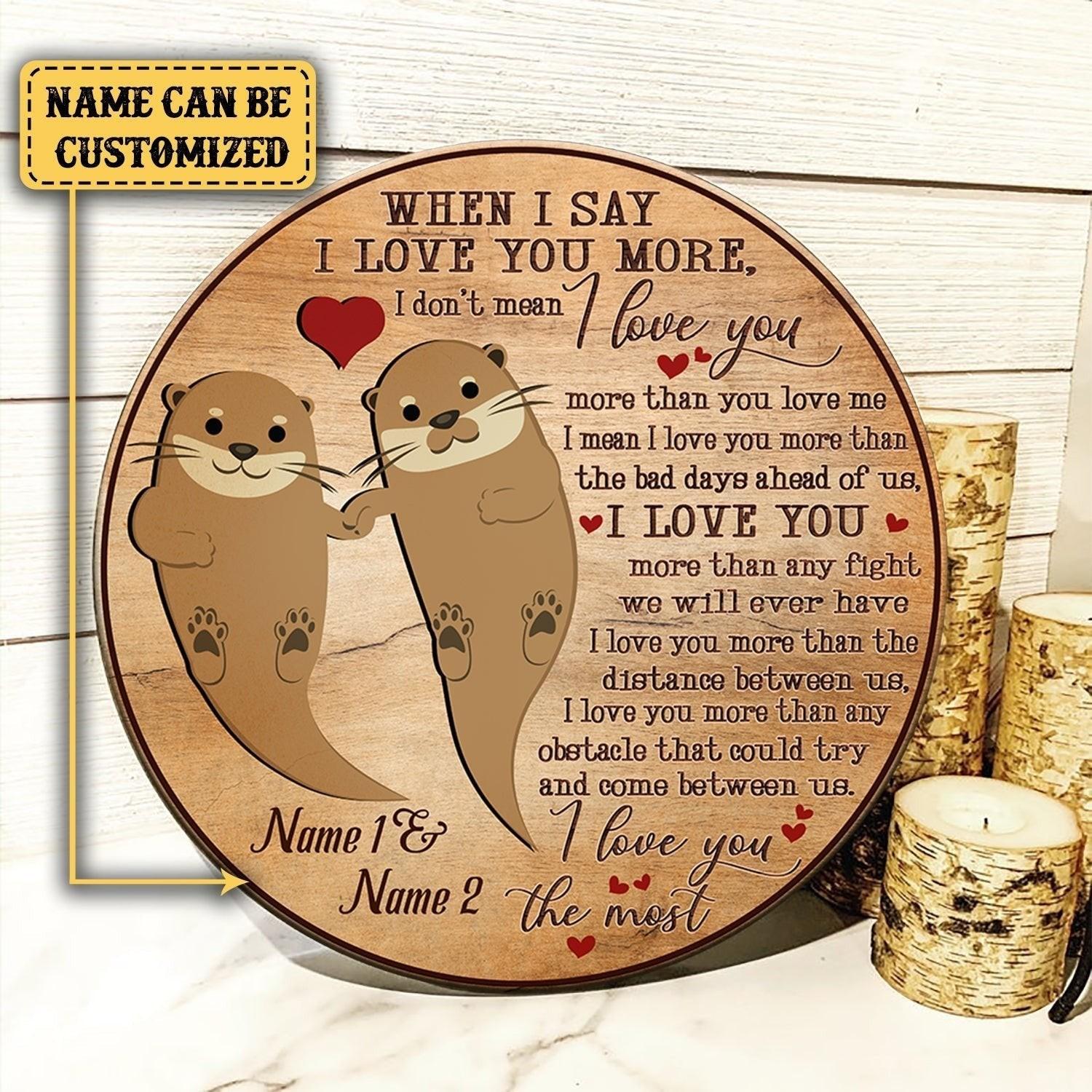 Personalized When I Say I Love You More Otter Wood Round Sign.